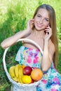 Happy girl and healthy vegetarian food, fruit