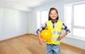 happy girl with helmet in safety vest and goggles Royalty Free Stock Photo