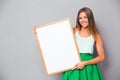 Happy girl holding blank board Royalty Free Stock Photo