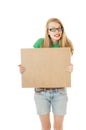 Happy girl holding empty wooden notice board.