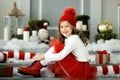 Happy little girl holding a lot of boxes with gifts. winter holidays, christmas and people concept.