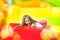 Happy Girl on Inflate Yellow Castle Royalty Free Stock Photo