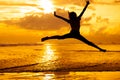 Happy girl jumping on the beach Royalty Free Stock Photo