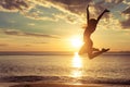 Happy girl jumping on the beach Royalty Free Stock Photo