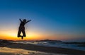 Happy girl jumping high at sunset Royalty Free Stock Photo