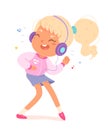 Happy girl listening music in earphones with dance, young person with headphones Royalty Free Stock Photo