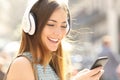 Happy girl listening music with headphones Royalty Free Stock Photo