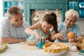 Happy girl making a pie Royalty Free Stock Photo