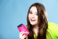 Happy girl with mobile phone in pink cover Royalty Free Stock Photo