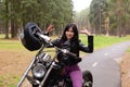 Happy girl on a motorcycle