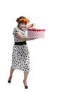 Happy girl opening gift box with red polka dots Royalty Free Stock Photo