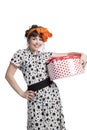 Happy girl opening gift box with red polka dots Royalty Free Stock Photo