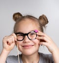 Happy girl in paper eyeglasses mask studio portrait Royalty Free Stock Photo