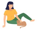 Happy girl patting cat. Smiling young woman sitting on the floor with adorable brown pet kitten