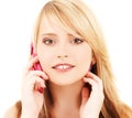 Happy girl with pink phone Royalty Free Stock Photo