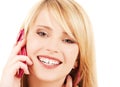 Happy girl with pink phone Royalty Free Stock Photo