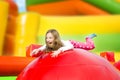 Happy Girl on the Playground Inflate Castle Royalty Free Stock Photo