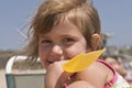 Happy girl playing on beach