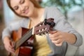 happy girl playing guitar and singing Royalty Free Stock Photo