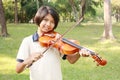 Happy girl playing her violin Royalty Free Stock Photo