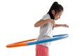 Happy girl playing hula hoop on white background. Royalty Free Stock Photo