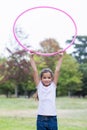 happy girl playing with hula hoops Royalty Free Stock Photo