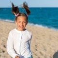 Happy girl with ponytails.