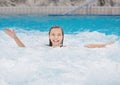 Happy girl in pool