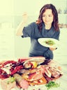 Happy girl prefers to eat greens and salad Royalty Free Stock Photo