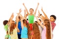 Happy girl with raised hands in group of kids Royalty Free Stock Photo