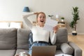 Happy girl reading good news about test results in letter Royalty Free Stock Photo