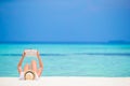 Happy girl reading during tropical white beach Royalty Free Stock Photo