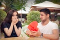 Happy Girl Receiving Heart Shaped Gift from her Boyfriend Royalty Free Stock Photo