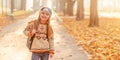 Happy girl returning from school