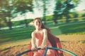 Happy girl riding on merry-go-round Royalty Free Stock Photo