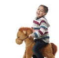 Happy Girl on Rocking Horse Royalty Free Stock Photo