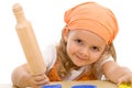 Happy girl with a rolling pin Royalty Free Stock Photo