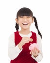 Happy girl save money with piggy bank Royalty Free Stock Photo