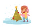 Happy Girl in Scarf and Earmuffs Decorating Christmas Tree with Baubles Enjoying Winter Vector Illustration