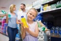 Happy girl selecting non-alcoholic beverage Royalty Free Stock Photo