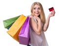 Happy girl with shopping bags and credit card Royalty Free Stock Photo