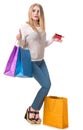 Happy girl with shopping bags and credit card Royalty Free Stock Photo