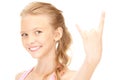 Happy girl showing devil horns gesture Royalty Free Stock Photo