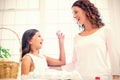 Happy girl showing easter egg to her mother Royalty Free Stock Photo