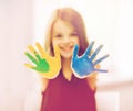 Happy girl showing painted hands Royalty Free Stock Photo