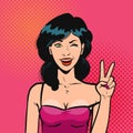 Happy girl shows hand gesture, victory sign. Portrait of beautiful young woman in pop art retro comic style. Cartoon