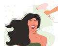 Happy girl sits in a beauty salon and dries her hair with a hairdryer Royalty Free Stock Photo
