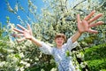 Happy girl in springtime blossom park Royalty Free Stock Photo