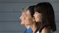 Happy girl standing in line with mother and grandmother, Royalty Free Stock Photo