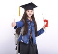 Happy girl student showing the thumbs up and  standing on white background Royalty Free Stock Photo